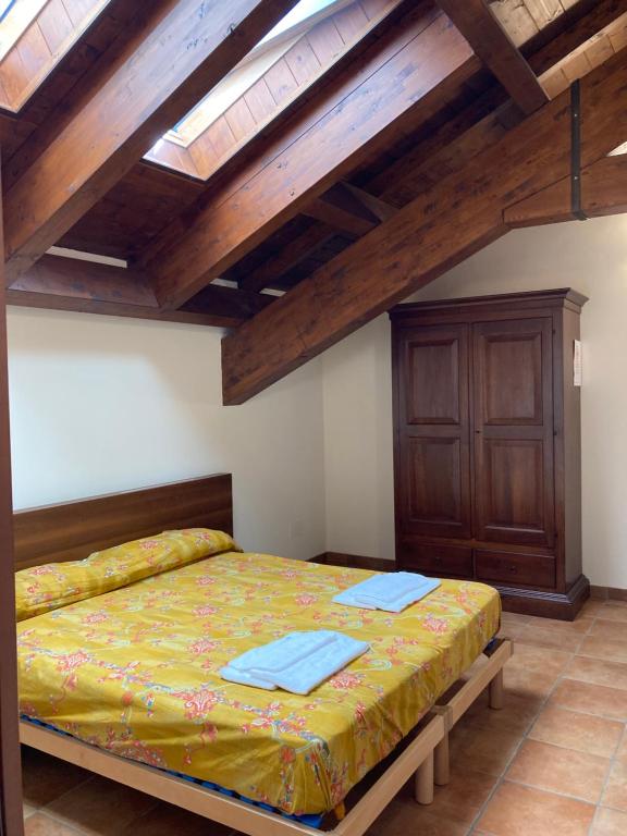 Posteľ alebo postele v izbe v ubytovaní Agriturismo Altana Del Motto Rosso