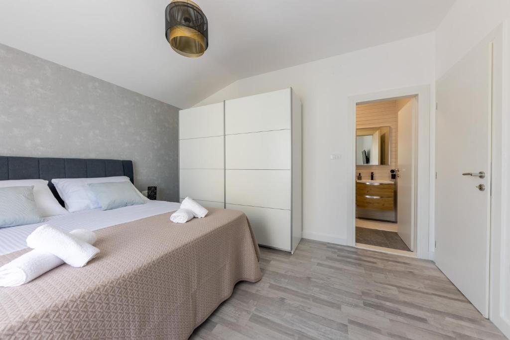 Posteľ alebo postele v izbe v ubytovaní Apartman Sisters - FREE parking