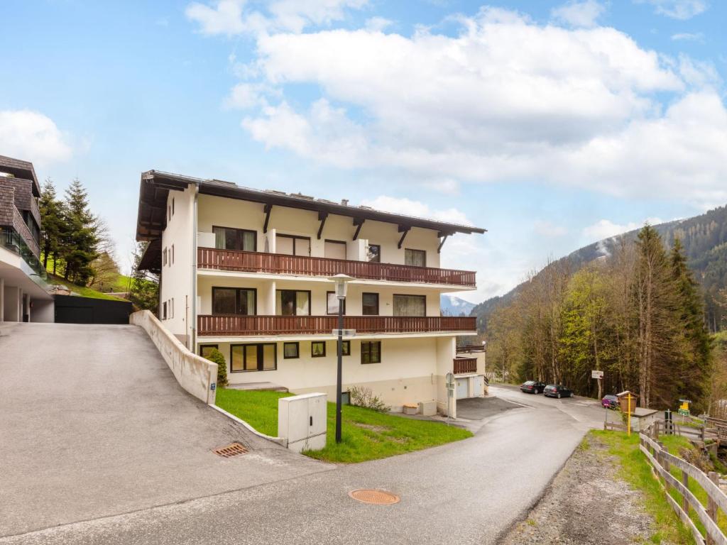 a building on the side of a road at Apartment Holiday-1 by Interhome in Zell am See