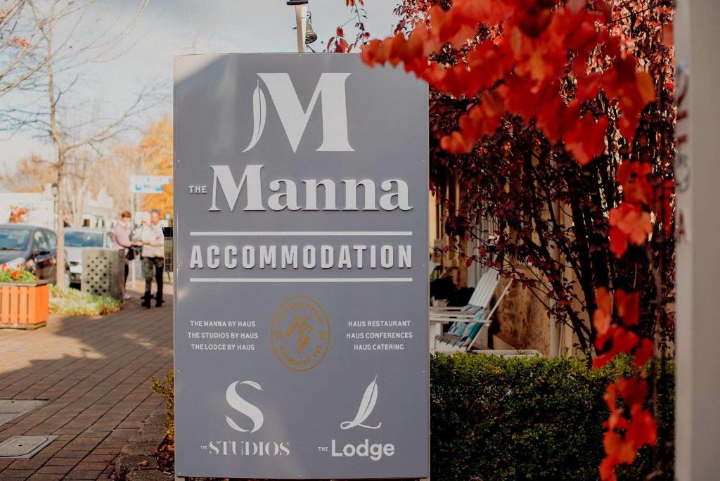 a sign for a mama association on a sidewalk at The Manna, Ascend Hotel Collection in Hahndorf