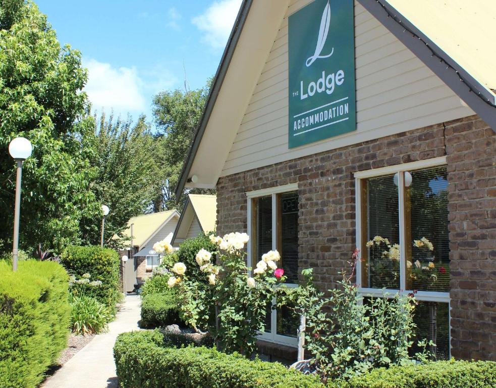 a store with a sign on the front of a building at The Lodge in Hahndorf