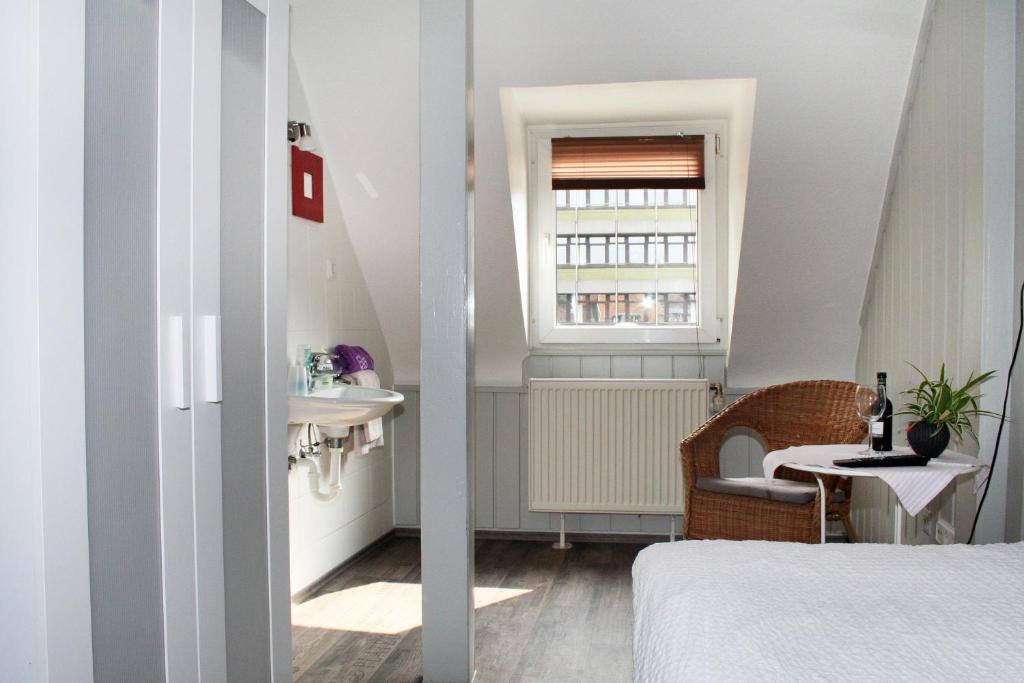 Postel nebo postele na pokoji v ubytování Hotel Klenkes am Bahnhof