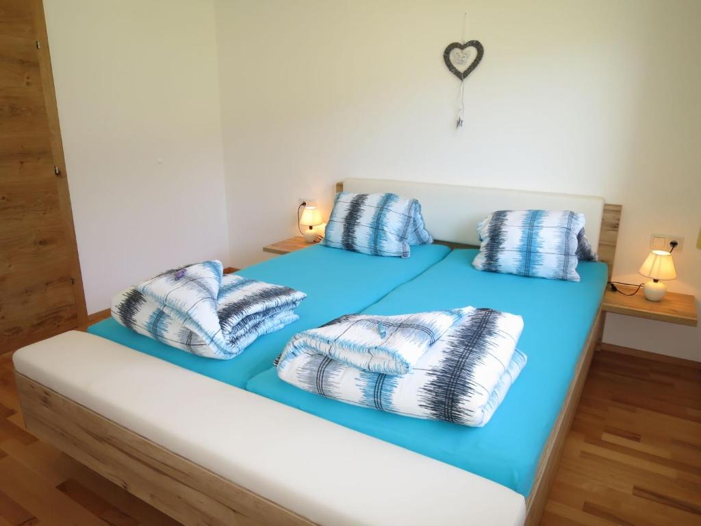 Postel nebo postele na pokoji v ubytování Apartment Zillertalblick by Interhome