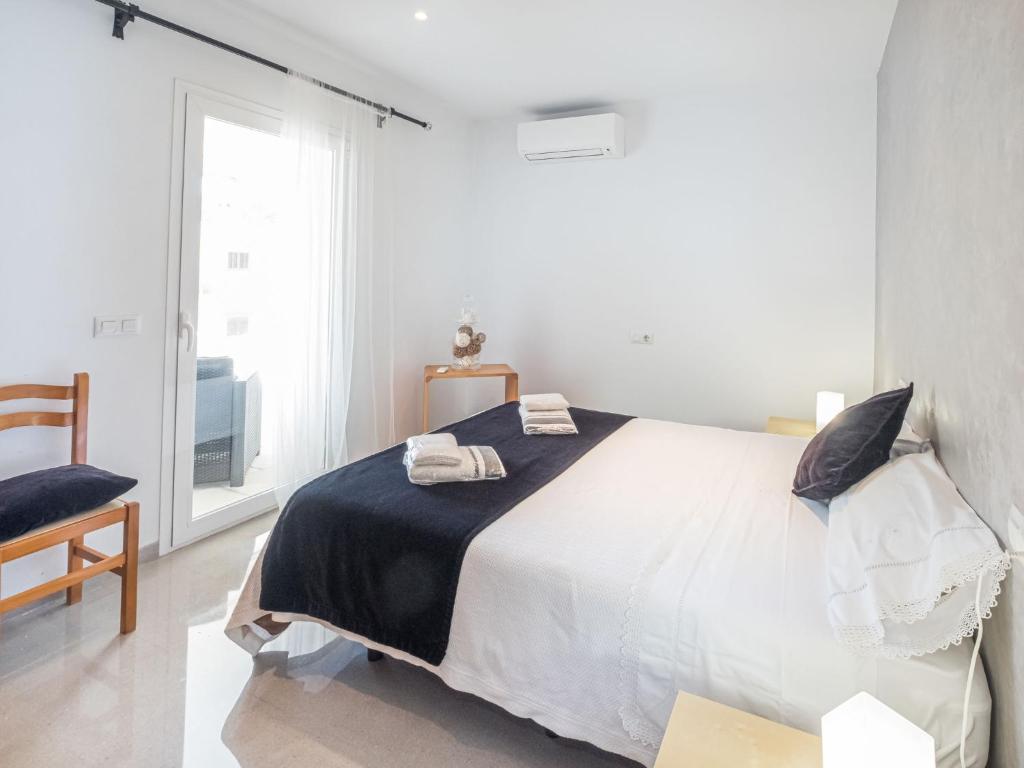 Postel nebo postele na pokoji v ubytování Apartment Misefo by Interhome