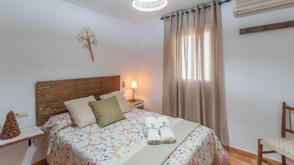 Posteľ alebo postele v izbe v ubytovaní Casa Los Baenas Casabermeja by Ruralidays