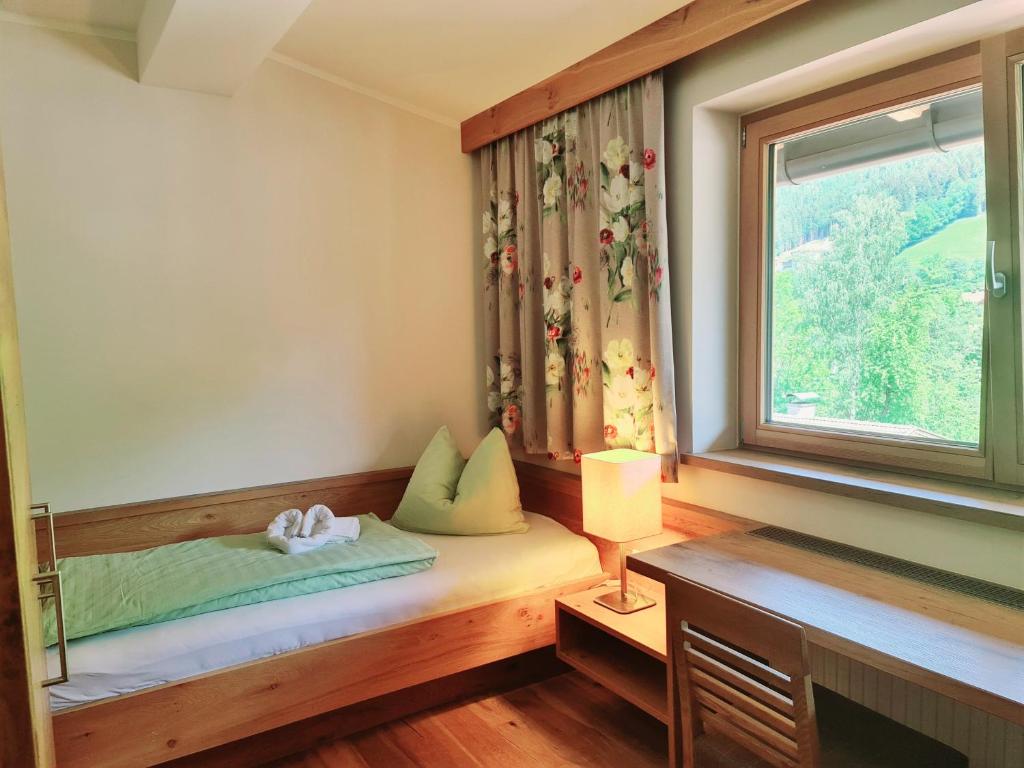 Posteľ alebo postele v izbe v ubytovaní Hotel Giessenbach