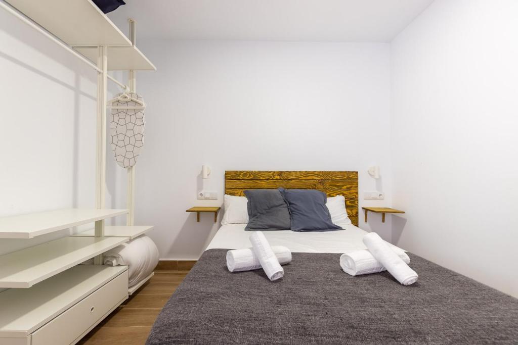 Posteľ alebo postele v izbe v ubytovaní FUN BUILDING STUDIOS by HOMEABOUT