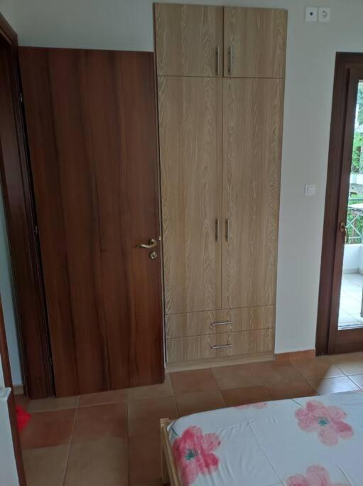 Łóżko lub łóżka w pokoju w obiekcie Marilia Home