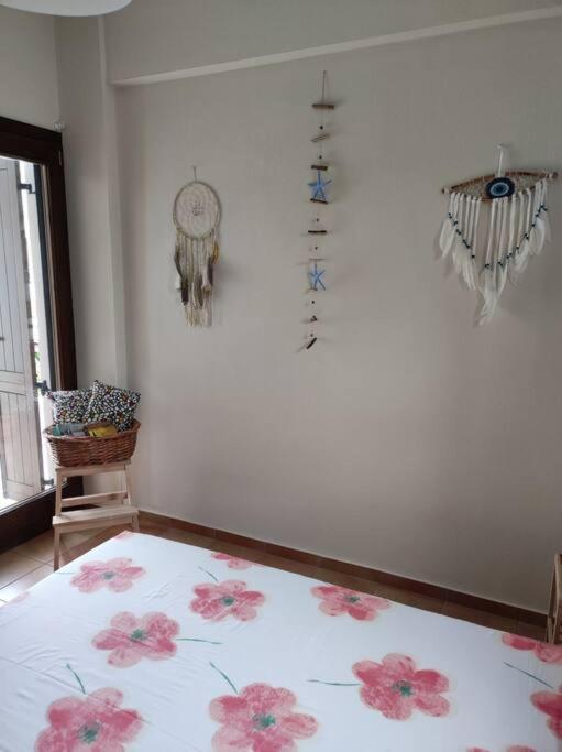 Łóżko lub łóżka w pokoju w obiekcie Marilia Home