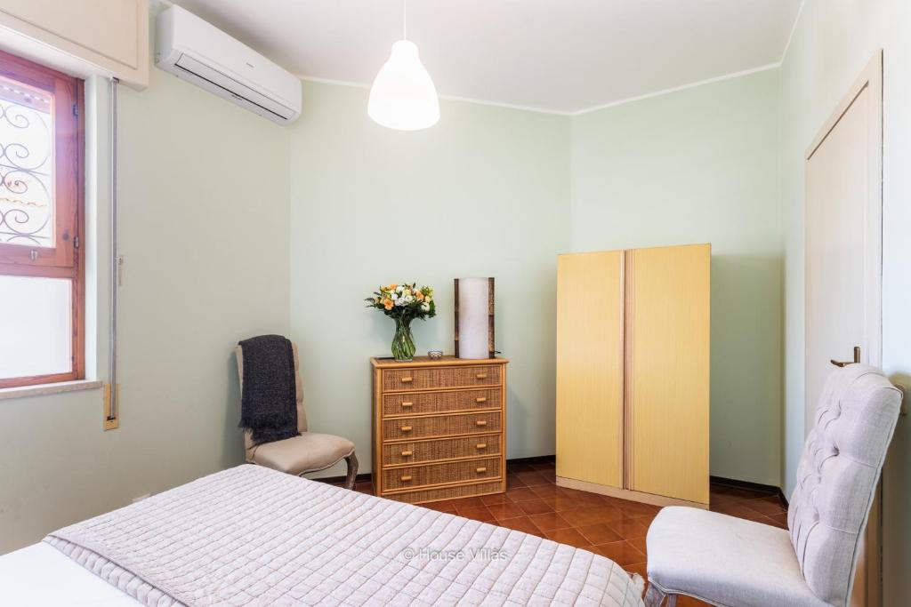 Posteľ alebo postele v izbe v ubytovaní House&Villas - Baia delle Sirene