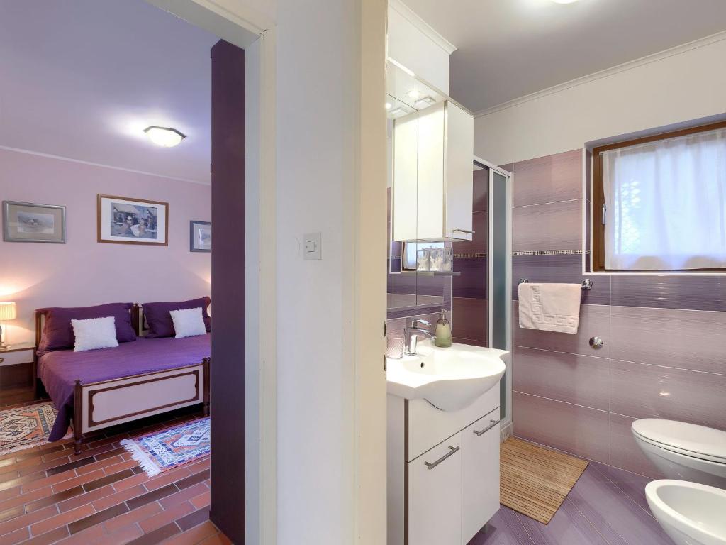 Posteľ alebo postele v izbe v ubytovaní Apartment Tiziana-3 by Interhome