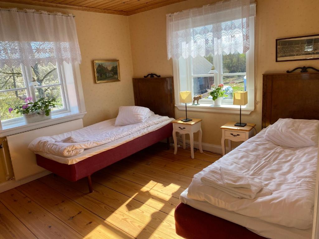 Postel nebo postele na pokoji v ubytování Spjutsbygds Gårds Bed and Breakfast