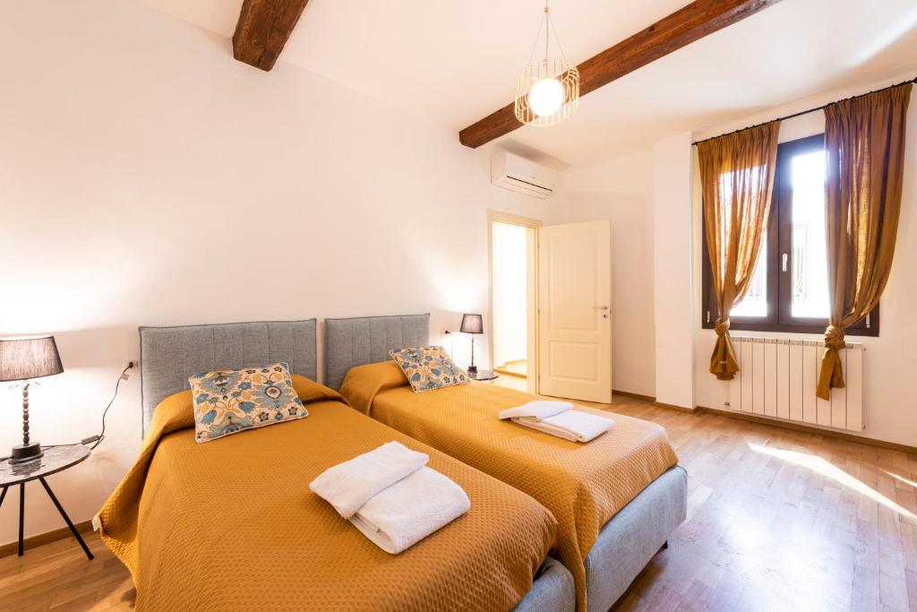 Posteľ alebo postele v izbe v ubytovaní Santa Croce Palace by Mmega