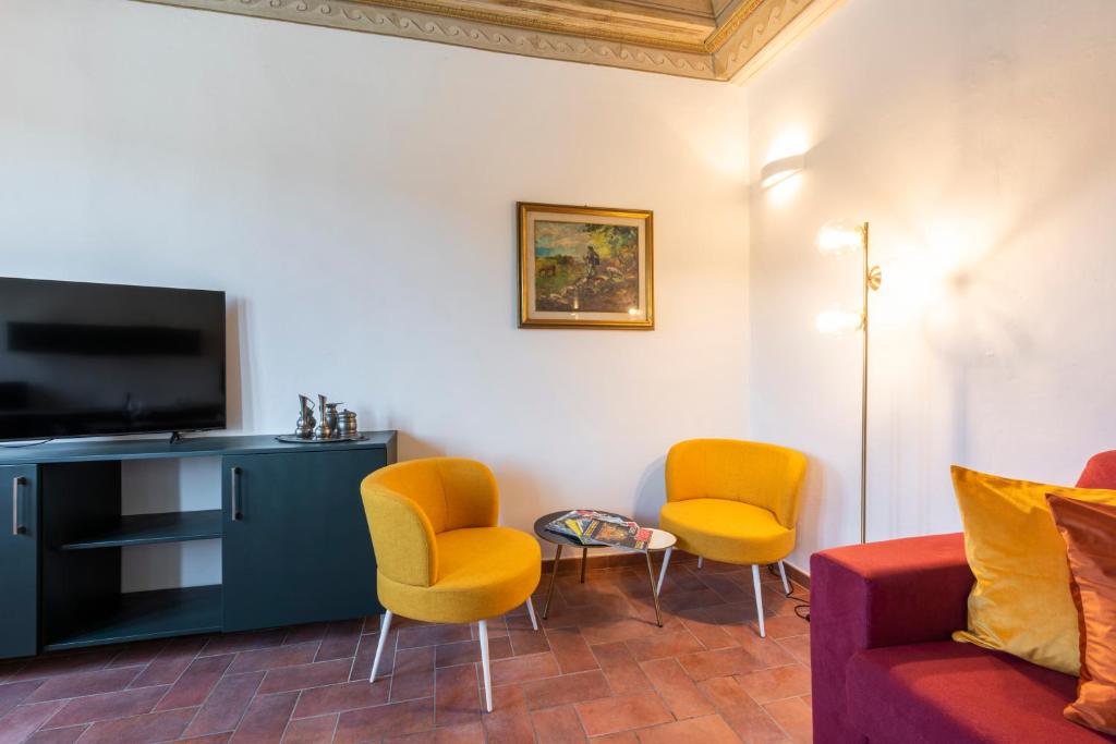 Televízia a/alebo spoločenská miestnosť v ubytovaní Santa Croce Palace by Mmega