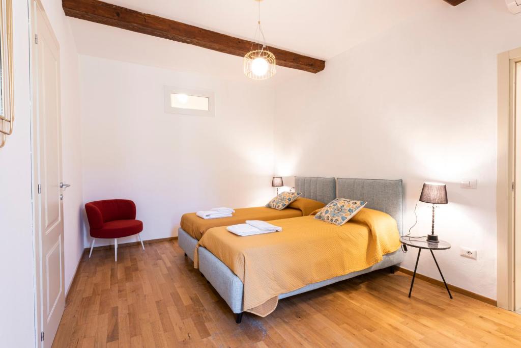Posteľ alebo postele v izbe v ubytovaní Santa Croce Palace by Mmega