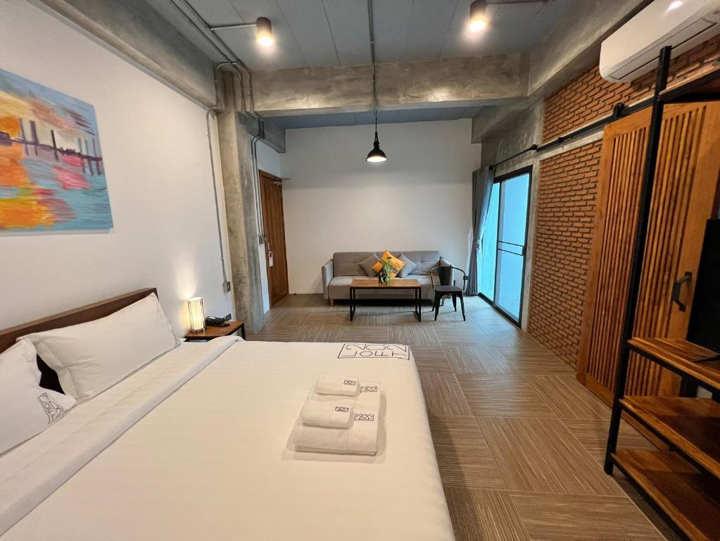 Postel nebo postele na pokoji v ubytování Loft 202 Hotel
