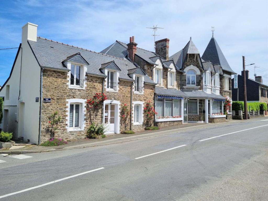 a row of houses on the side of a street at Apartment Le Petit Robinson-7 by Interhome in La Richardais