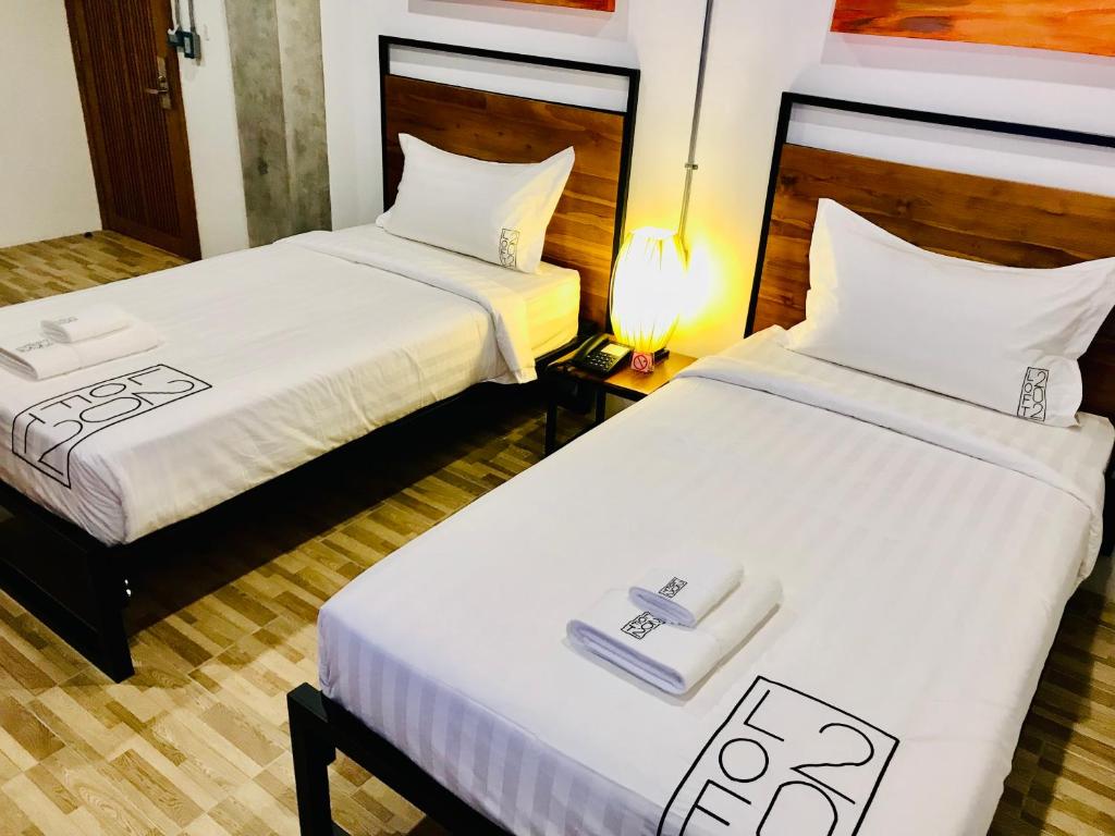 Postel nebo postele na pokoji v ubytování Loft 202 Hotel
