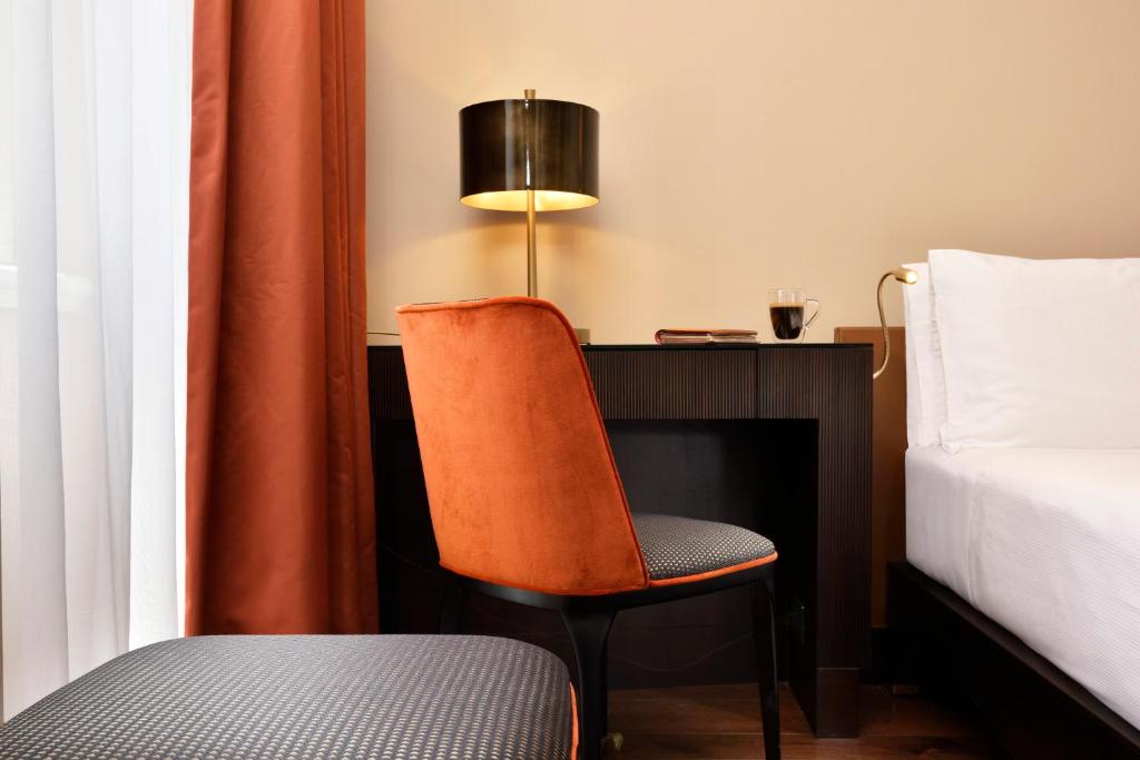 Postel nebo postele na pokoji v ubytování Hotel L'Orologio Roma - WTB Hotels