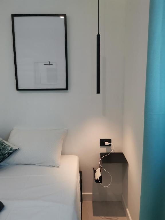 Postel nebo postele na pokoji v ubytování Moderni apartman Tina