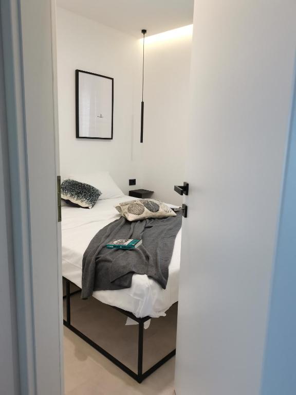 Postel nebo postele na pokoji v ubytování Moderni apartman Tina