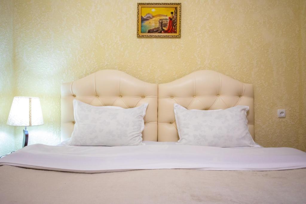 Postel nebo postele na pokoji v ubytování HOTEL VLADi
