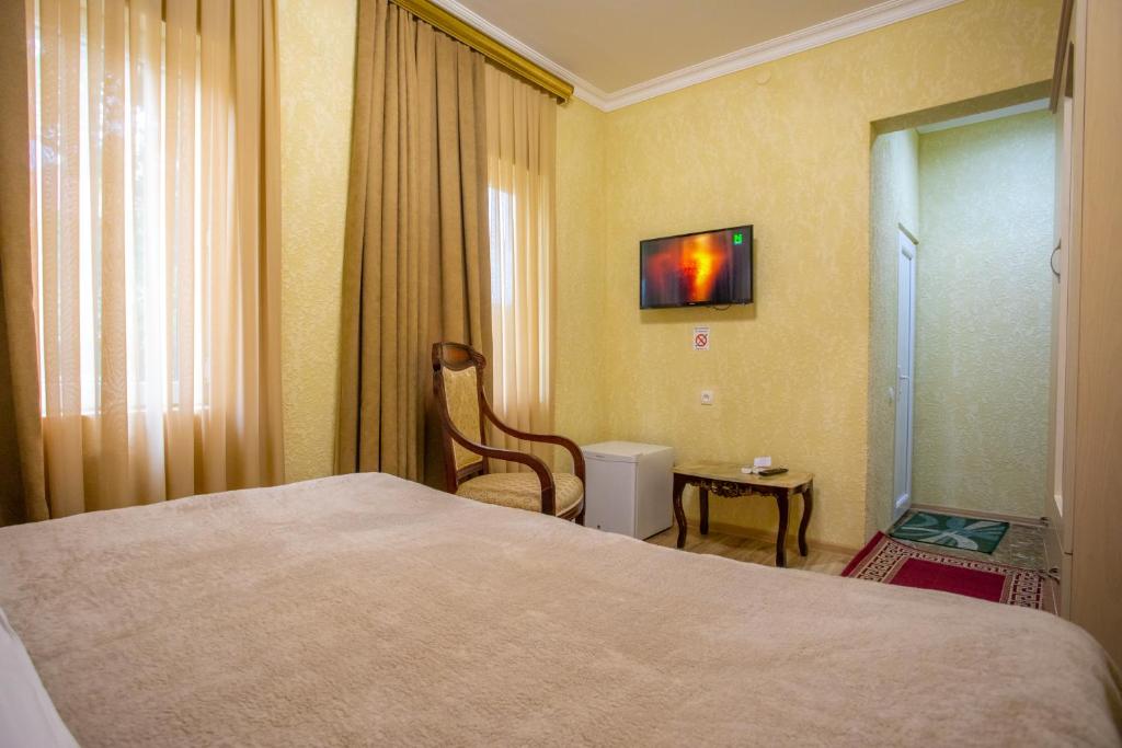 Postel nebo postele na pokoji v ubytování HOTEL VLADi