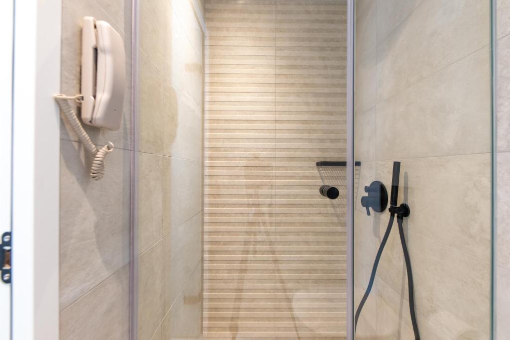Koupelna v ubytování El Greco Hotel