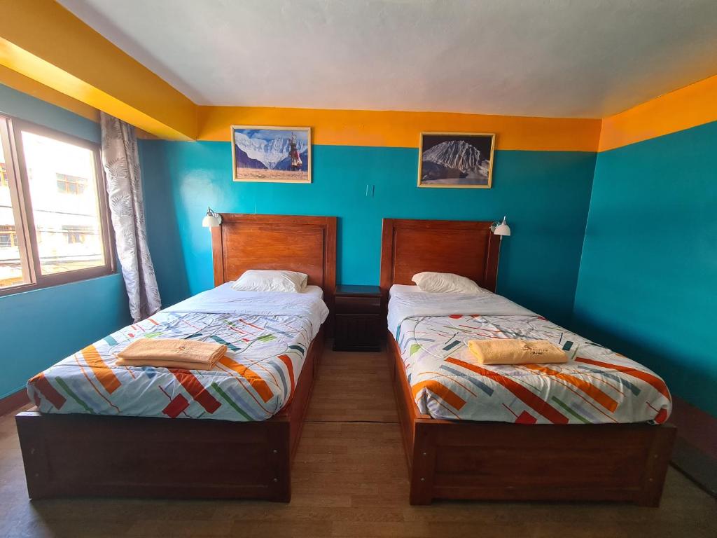 Postel nebo postele na pokoji v ubytování Big Mountain Hostel