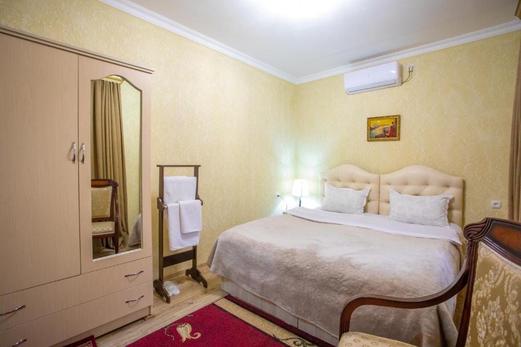 Postel nebo postele na pokoji v ubytování HOTEL VLADi