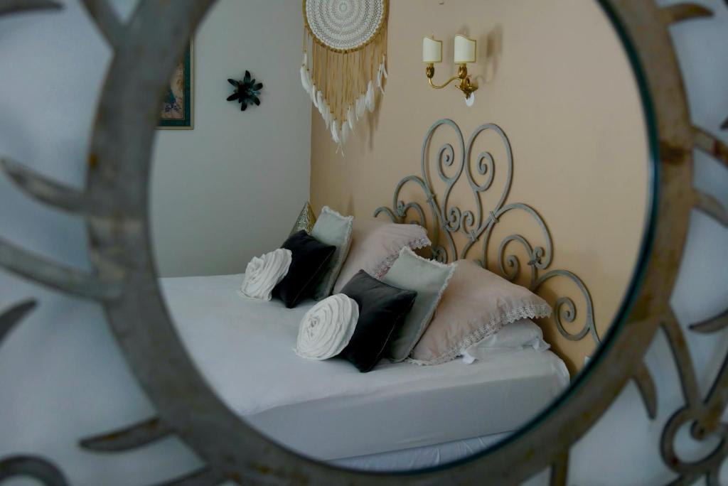 Postel nebo postele na pokoji v ubytování Manoir de Chantemerle