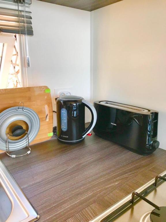 Příslušenství pro přípravu čaje a kávy v ubytování Mobil Home Vue sur Mer - Racine 03