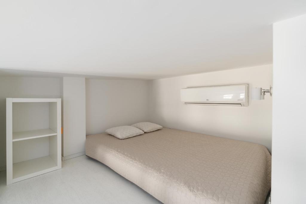 Posteľ alebo postele v izbe v ubytovaní Apartments Nowe Chwaliszewo by Noclegi Renters
