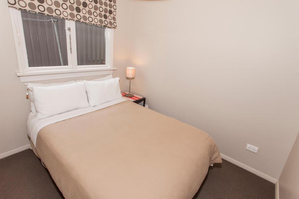 Postel nebo postele na pokoji v ubytování Wanaka View Motel