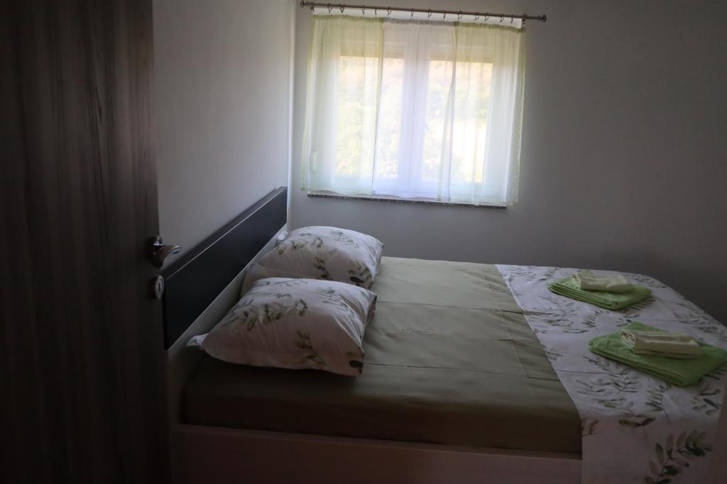 A bed or beds in a room at Apartment Mario