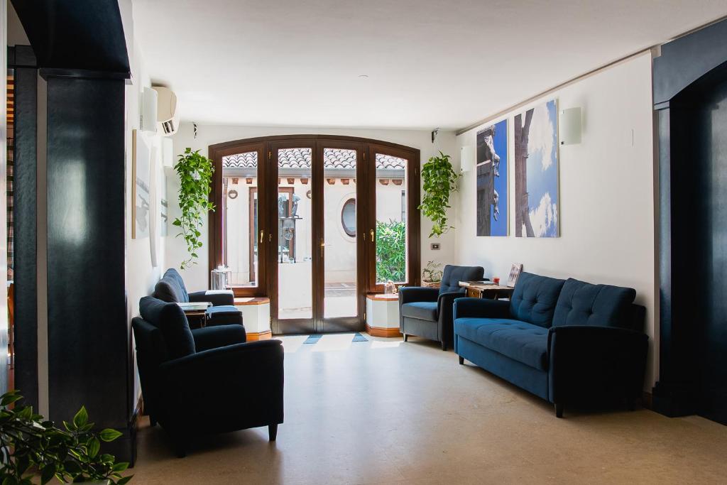 Posezení v ubytování Boutique Rooms 3 0