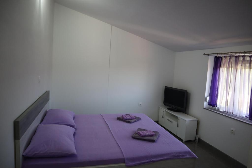 A bed or beds in a room at Apartment Mario