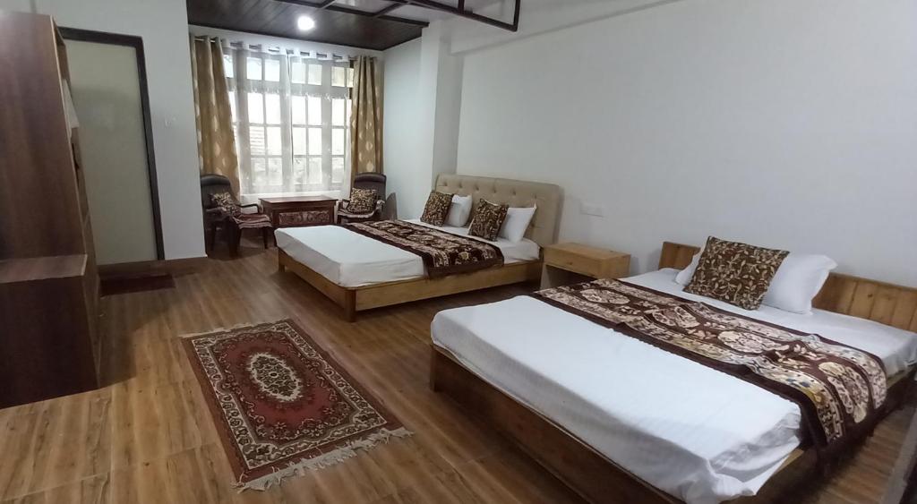 Postel nebo postele na pokoji v ubytování Sherpa Villa