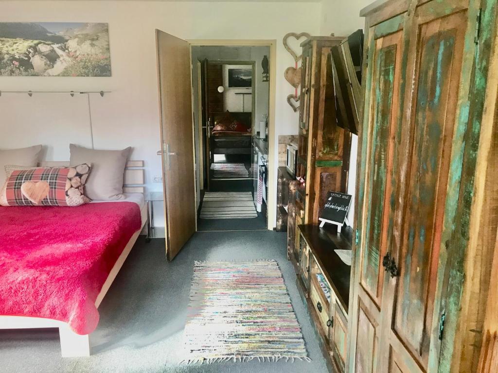 Postel nebo postele na pokoji v ubytování Apartment Gletscherbergblick