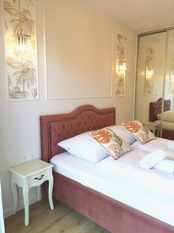 Posteľ alebo postele v izbe v ubytovaní Apartament In the Jungle Karpatia Resort