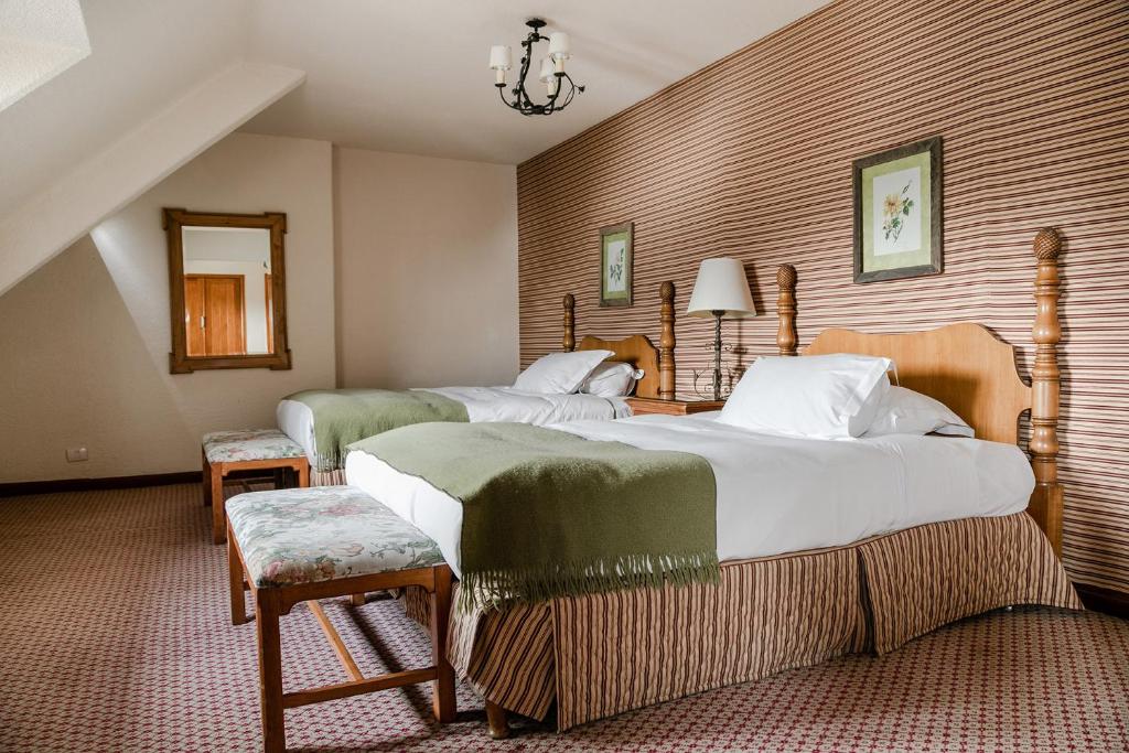 Cama ou camas em um quarto em Llao Llao Resort, Golf-Spa