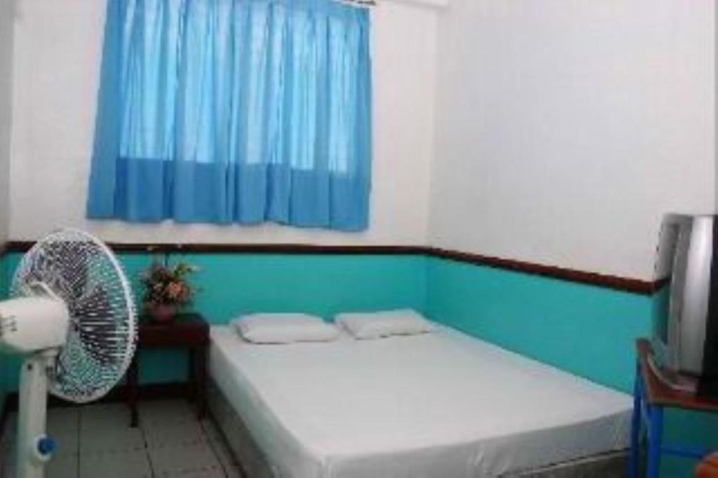 Postel nebo postele na pokoji v ubytování GV Hotel - Camiguin