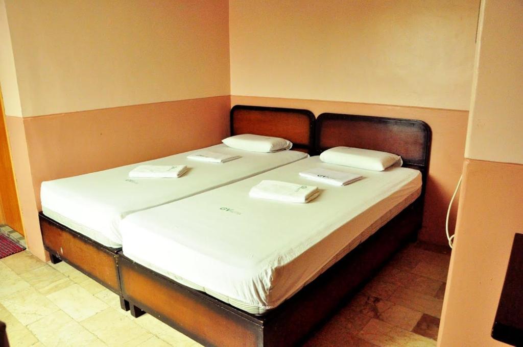 Postel nebo postele na pokoji v ubytování GV Hotel - Camiguin