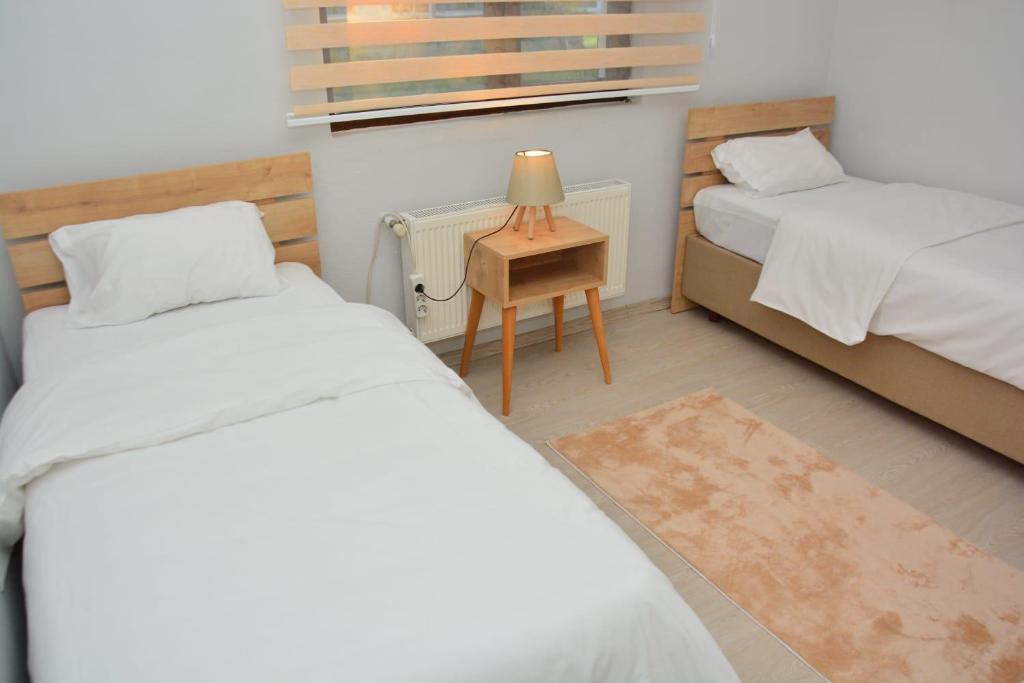 Postel nebo postele na pokoji v ubytování Villa Five Star