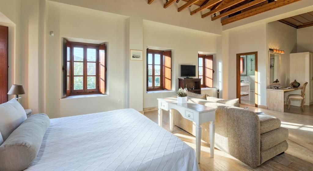 Postel nebo postele na pokoji v ubytování Mare Monte Luxury Suites