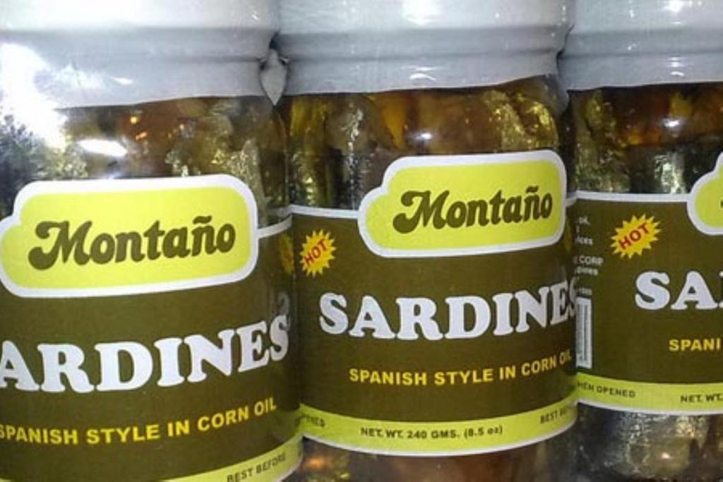 a group of three jars of sardines on a shelf at GV Hotel - Dipolog in Dipolog