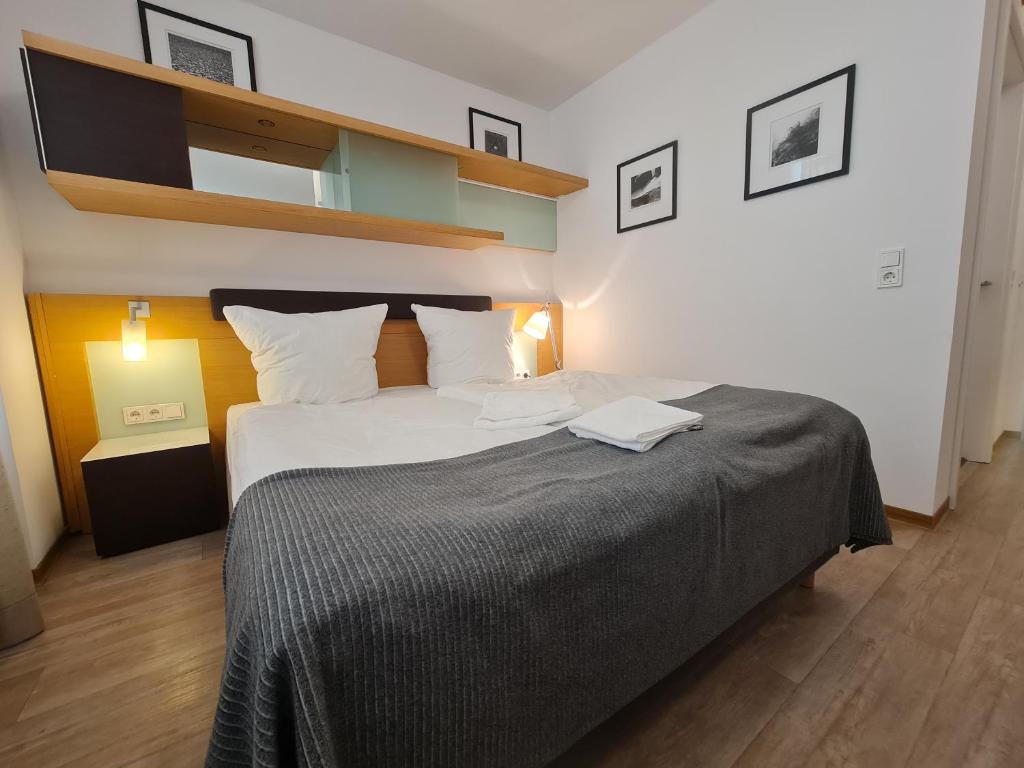 Postel nebo postele na pokoji v ubytování check-inn hotels - Offenbach