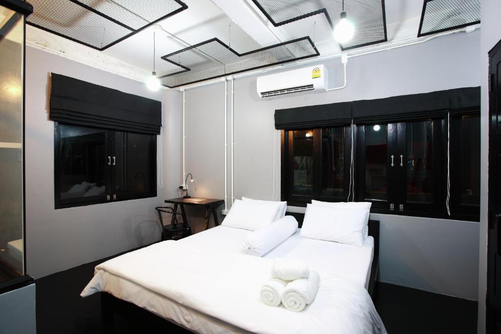 Ένα ή περισσότερα κρεβάτια σε δωμάτιο στο Meroom