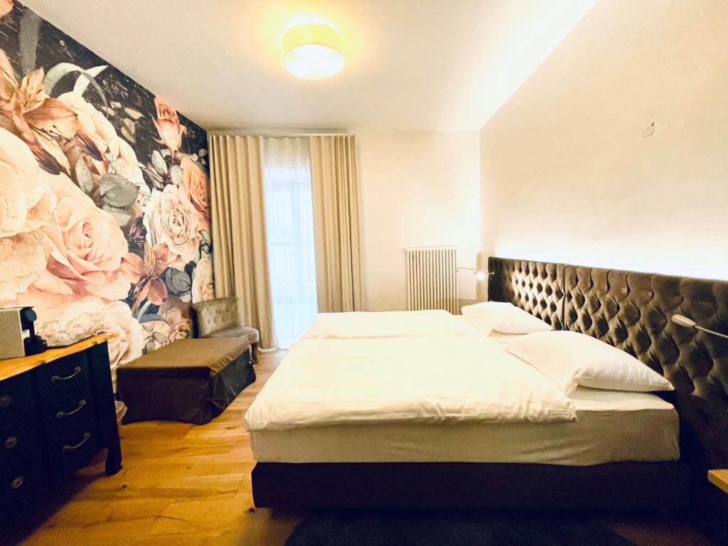 Postel nebo postele na pokoji v ubytování Hotel Cittadella