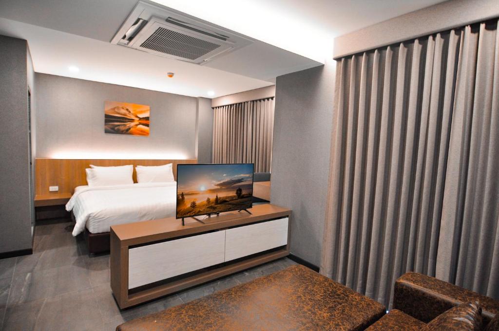 Postel nebo postele na pokoji v ubytování The S Block Condotel